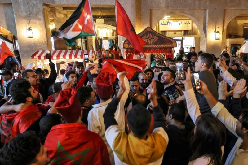 Morocco fans celebrate in Souq Waqif.