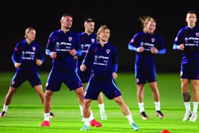 Croatia’s midfielder Luka Modric (centre) takes part in a training session in Doha. (AFP)