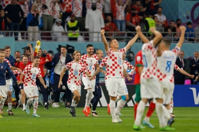 Croatia&#039;s players react at the final whistle as they win the Qatar 2022 World Cup third place play-off match between Croatia and Morocco at Khalifa International Stadium in Doha. AFP