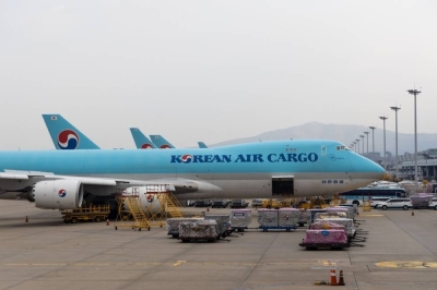Cargo bound for sits on the tarmac next to Korean Air Lines freight aircraft at the company&#039;s cargo terminal in Incheon International Airport in South Korea. High inflation, interest rates and energy costs may put global air freight under mounting pressure in 2023 as headwinds continue to affect air cargo demand.