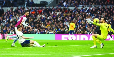 Aston Villa’s Douglas Luiz scores a goal against Tottenham Hotspur in London yesterday. (Reuters)