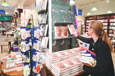 A bookseller prepares a display for &#039;Spare&#039; by Britain&#039;s Prince Harry, at Daunt Books on Marylebone High Street in London Tuesday. 