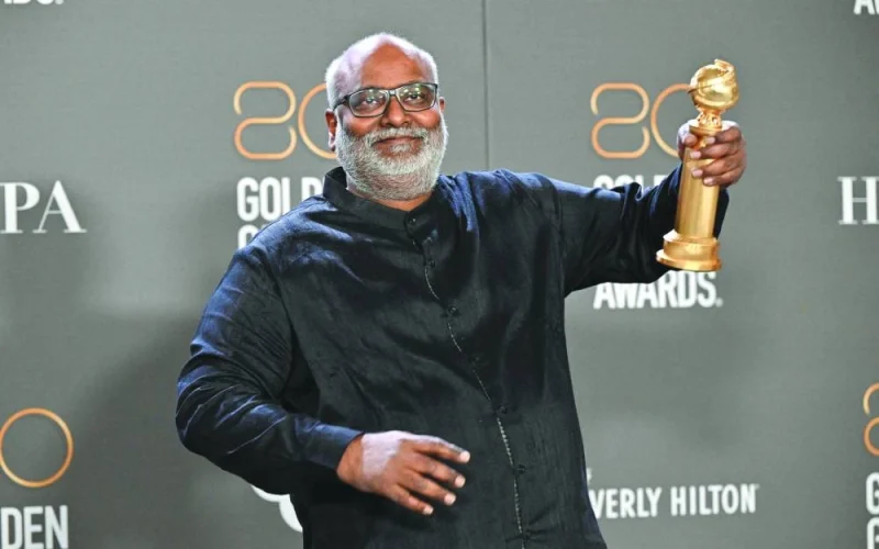Indian film composer M M Keeravani poses with the award for Best Song — Motion Picture for Naatu Naatu from RRR in the press room during the 80th annual Golden Globe Awards at The Beverly Hilton hotel in California.