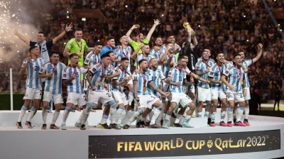 Lionel Messi of Argentina and teammates celebrate with the FIFA World Cup trophy after the final against France at Lusail Stadium. Picture courtesy of FIFA