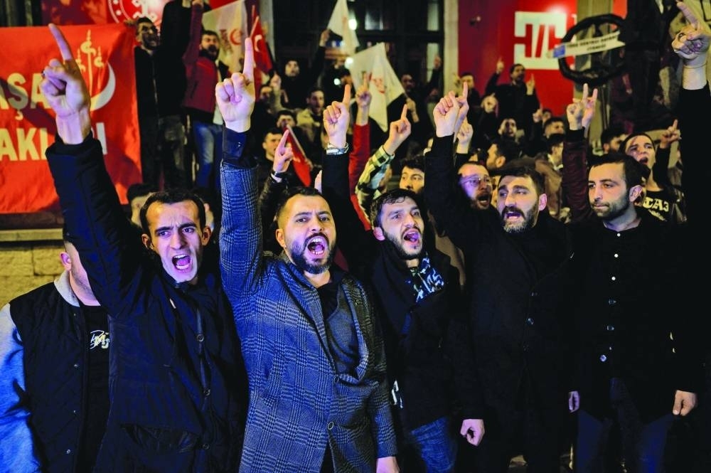 Protesters demonstrate in front of the Consulate General of Sweden in Istanbul after a far-right political party leader burned a copy of the Holy Koran near the Turkish Embassy in Stockholm.
