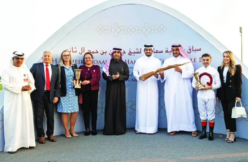 HE Sheikh Al Qaqa bin Hamad al-Thani presented the trophies to connections of Scherzo, which won the HE Sheikh Joaan Bin Hamad Al Thani Rifle at the Al Rayyan Racecourse yesterday. Qatar Racing and Equestrian Club Chairman Issa bin Mohamed al-Mohannadi is also seen in the picture. PICTURES: Juhaim