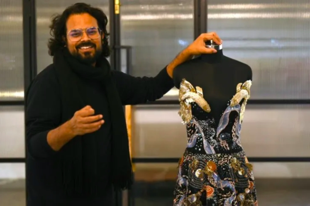 Indian fashion designer Rahul Mishra&#039;s new collection, "Cosmos", evokes the boundless mysteries of life, told through his trademark embroidered flourishes of animal contours and luminous details.
