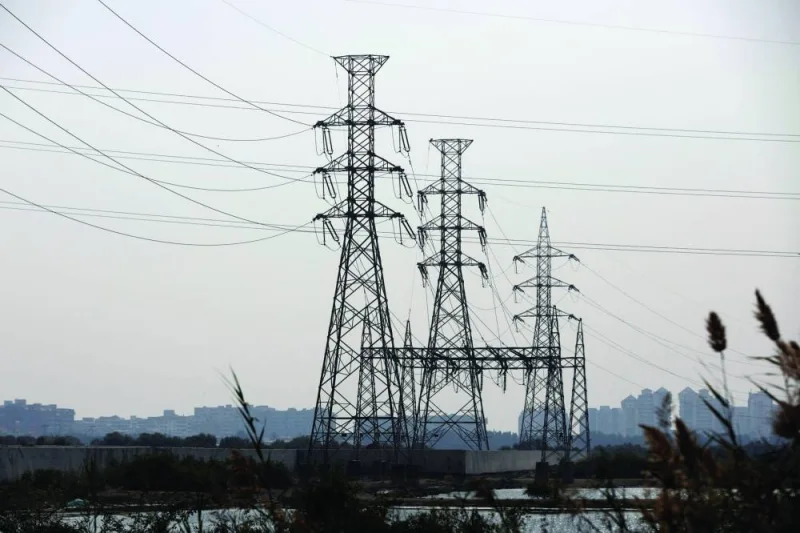 A power transmission tower is seen a day after a country-wide power breakdown in Karachi yesterday. (Reuters)
