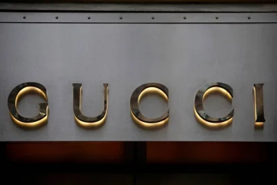 A Gucci sign is seen outside a shop in Paris, France, January 27, 2023 (Reuters)