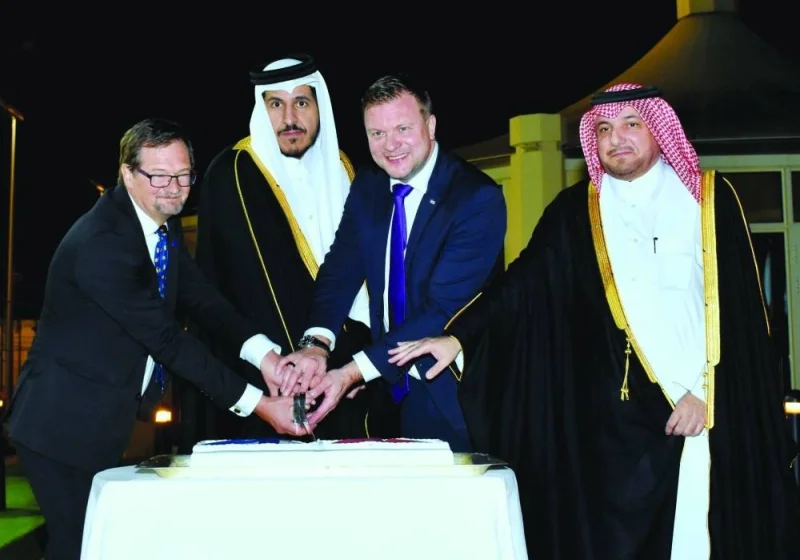 Finnish Minister of Foreign Trade and Development Ville Skinnari (third left) and Pekka Voulilanainen (left) are joined by Qatar&#039;s Minister of Commerce and Industry HE Sheikh Mohamed bin Hamad bin Qassim al-Abdullah al-Thani and Ministry of Foreign Affairs&#039; Department of Protocol director Ibrahim Fakhro in cutting a cake at the inaugural ceremony of the Embassy of Finland in Doha Sunday. PICTURE: Thajudheen