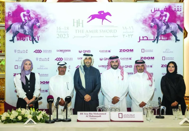 QREC Chairman Issa bin Mohamed al-Mohannadi (third from left), QREC Acting CEO Bader al-Darwish (second from right) and QREC Racing Manager Abdulla Rashid al-Kubaisi (second from left) pose with the sponsors of HH The Amir Sword Festival yesterday. PICTURE: Juhaim