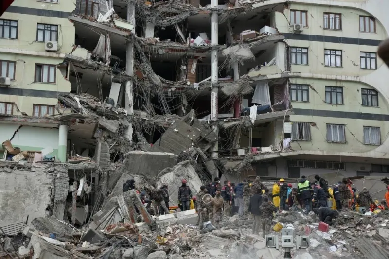 Rescue workers search for survivors under the rubble following an earthquake in Diyarbakir, Turkey. REUTERS