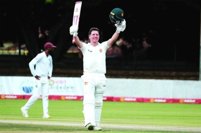 Gary Ballance of Zimbabwe celebrates scoring a century against the West Indies during day four of the first Test in Bulawayo yesterday. (@ZimCricketv)