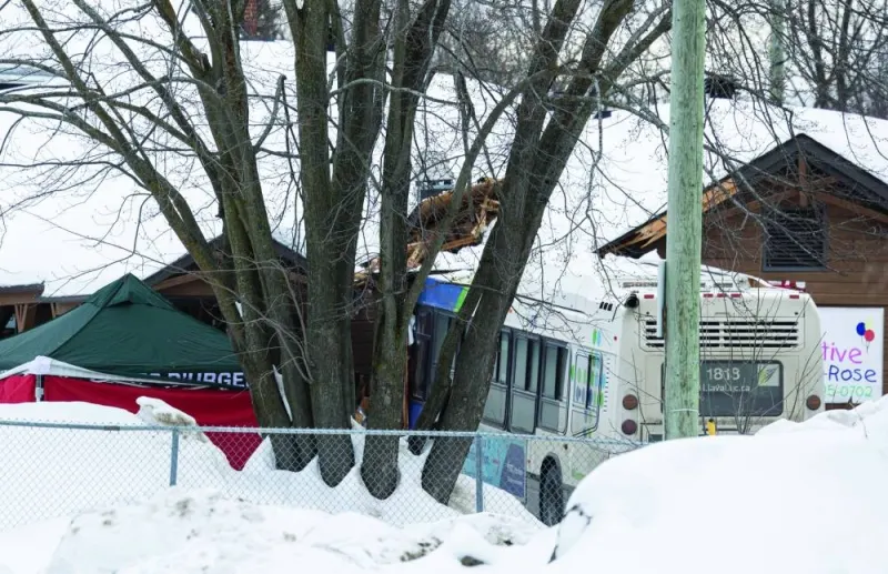 A Laval city bus is seen crashed into a daycare in Laval, Quebec yesterday. (Reuters)