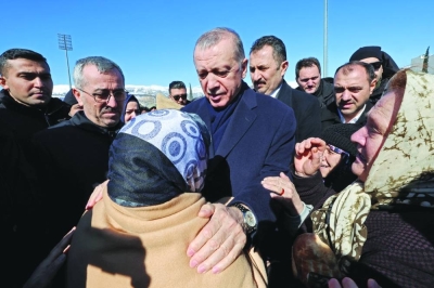 Turkish President Tayyip Erdogan meets with people in the aftermath of a deadly earthquake in Kahramanmaras yesterday. (Reuters)