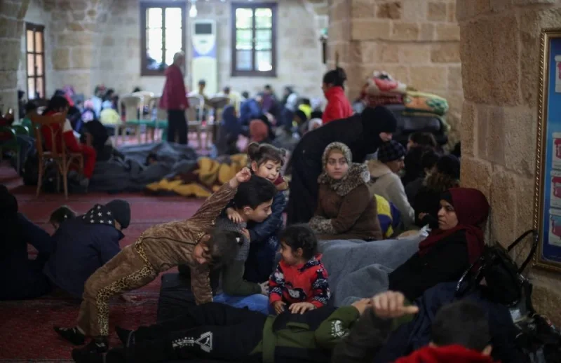 People take shelter inside a mosque, following an earthquake, in Jableh, Syria, Thursday. REUTERS