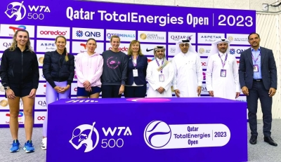 Qatar Tennis Federation Secretary-General Tareq Zainal and Qatar TotalEnergies Open Tournament Director Saad al-Mohannadi pose with players and other officials after the draw ceremony at the Khalifa Tennis and Squash Complex yesterday. PICTURE: Noushad Thekkayil