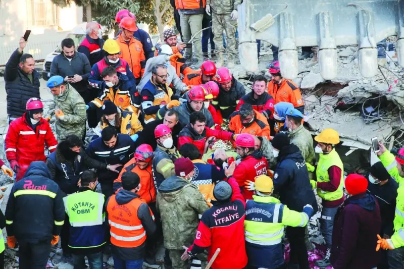 Rescue workers carry Turkish teenager Kaan to an ambulance after being rescued from the rubble after 182 hours, in the aftermath of a deadly earthquake in Hatay, Turkiye, yesterday. (Reuters)