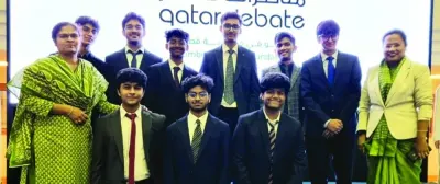 DPS-MIS debaters who topped Qatar School Debate League-II (Boys) with their coaches.