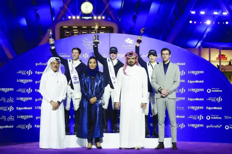 Her Highness Sheikha Moza bint Nasser, Chairperson of Qatar Foundation for Education, Science and Community Development (QF), poses with the podium winners of the Commercial Bank CHI Al Shaqab Grand Prix Presented by Longines yesterday. Qatar Olympic Committee President HE Sheikh Joaan bin Hamad al-Thani and Michael Vuilleumer, International Sponsorship and Events Project Leader of Longines, also attended the prize-giving ceremony. PICTURE: Aisha al-Meslam
