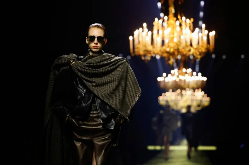 A model presents a creation by designer Anthony Vaccarello as part of his Fall-Winter 2023/2024 Women's ready-to-wear collection show for fashion house Saint Laurent during Paris Fashion Week in Paris, France, February 28, 2023. REUTERS/Sarah Meyssonnier