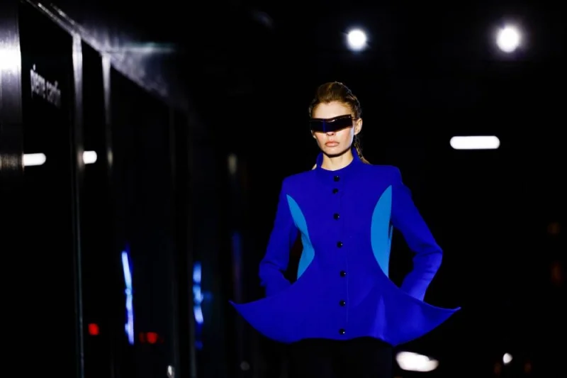 A model presents a creation of Pierre Cardin Fall-Winter 2023/2024 Women's ready-to-wear collection show during Paris Fashion Week in Paris, France, March 5, 2023. REUTERS/Sarah Meyssonnier
