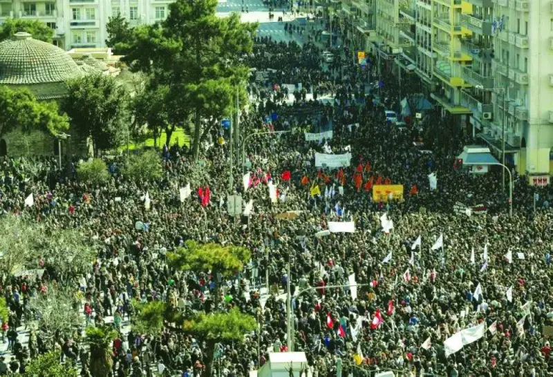 Thousands march in Athens  in protest over the reported negligence of the authorities that led to the train crash last week.