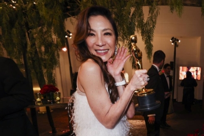 Best Actress Michelle Yeoh poses with her Oscar at the Governors Ball following the Oscars show at the 95th Academy Awards in Hollywood, Los Angeles. REUTERS