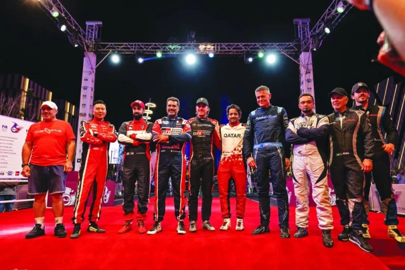 Qatar International Baja competitors pose after the ceremonial start at the Lusail Boulevard on Thursday evening. 
