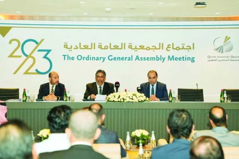 Members of QIG board of directors at the company&#039;s ordinary general assembly meeting on Tuesday. 