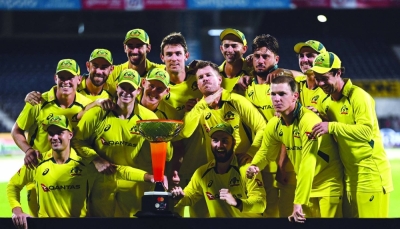 Australia’s players celebrate after winning the third one-day international (ODI) against India at the MA Chidambaram Stadium in Chennai on Wednesday. (AFP) 