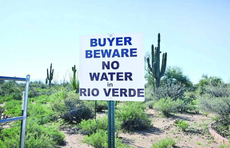 In this file photo taken on February 24, 2023 a sign warns home and property buyers about the water situation in Rio Verde, an unincorporated community in Maricopa County, outside of Scottsdale, Arizona. (AFP)