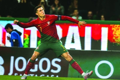 Portugal’s Cristiano Ronaldo celebrates after scoring against Liechtenstein during the UEFA Euro 2024 qualification match. (AFP)