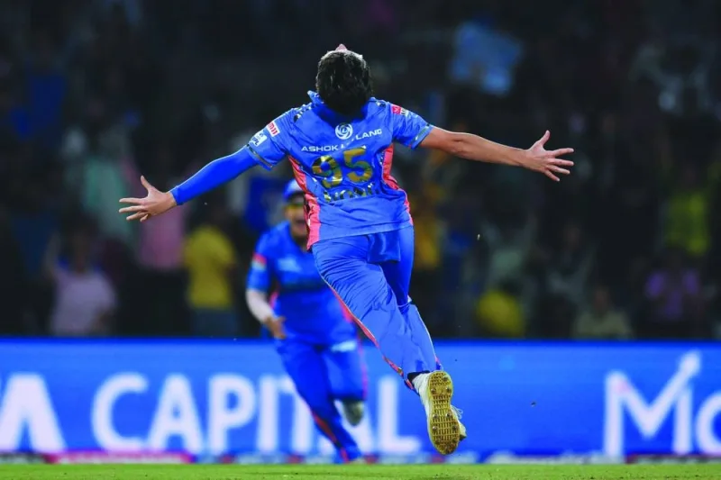 Mumbai Indians’ Issy Wong celebrates after taking the wicket of UP Warriorz’s Sophie Ecclestone during the 2023 Women’s Premier League Twenty20 eliminator match in Navi Mumbai yesterday. (AFP) 
