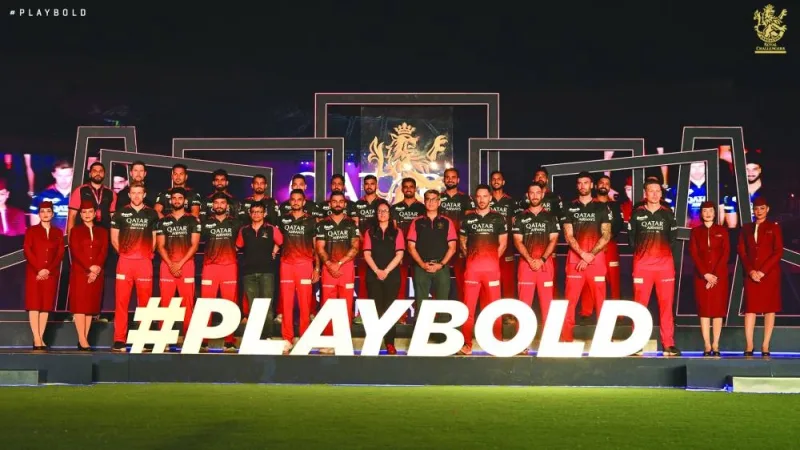 The Royal Challengers Bangalore players sporting the new team jerseys with Qatar Airways logo emblazoned on the front. 