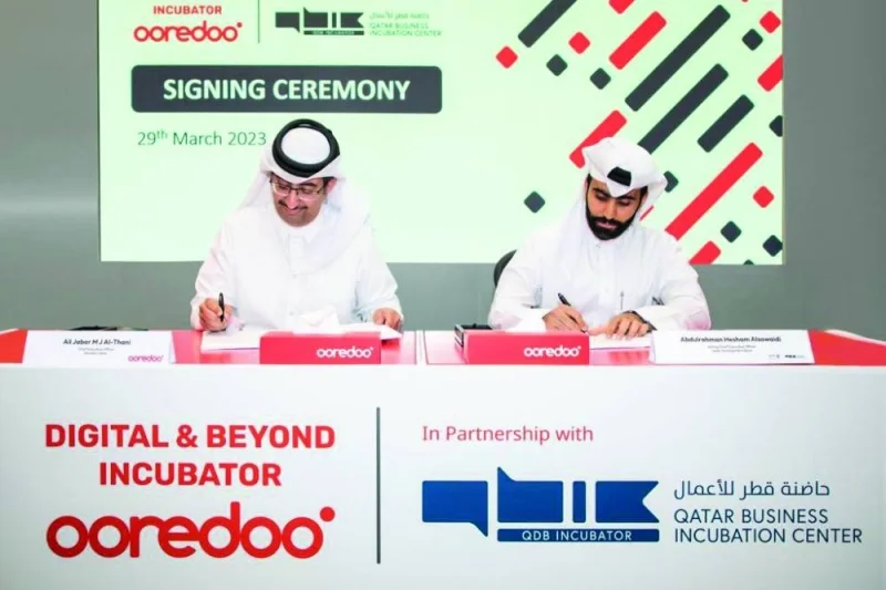 Ooredoo CEO Sheikh Ali bin Jabor al-Thani and QDB acting CEO Abdulrahman Hesham al-Sowaidi signing the agreement Wednesday.