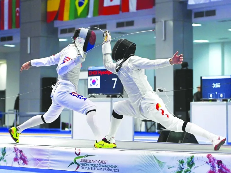Action from Junior and Cadet Fencing World Championships being held in Plovdiv, the second-largest city in Bulgaria, yesterday. Chinese fencer Yifan Guo won the title of Cadet Men’s Individual Foil by beating Hyeokjun Choi from South Korea 15-13 in the final. (@FIE_fencing)