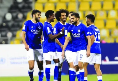 Al Sadd players celebrate their victory over Qatar SC in the QNB Stars League match on Saturday.