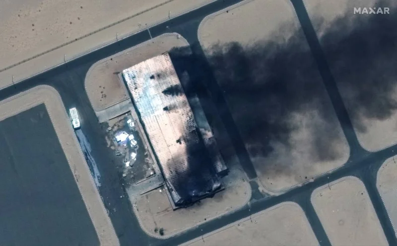 Satellite image shows a closer view of a burning building at the Merowe Airbase, Sudan, April 18. Maxar Technologies/Handout via REUTERS