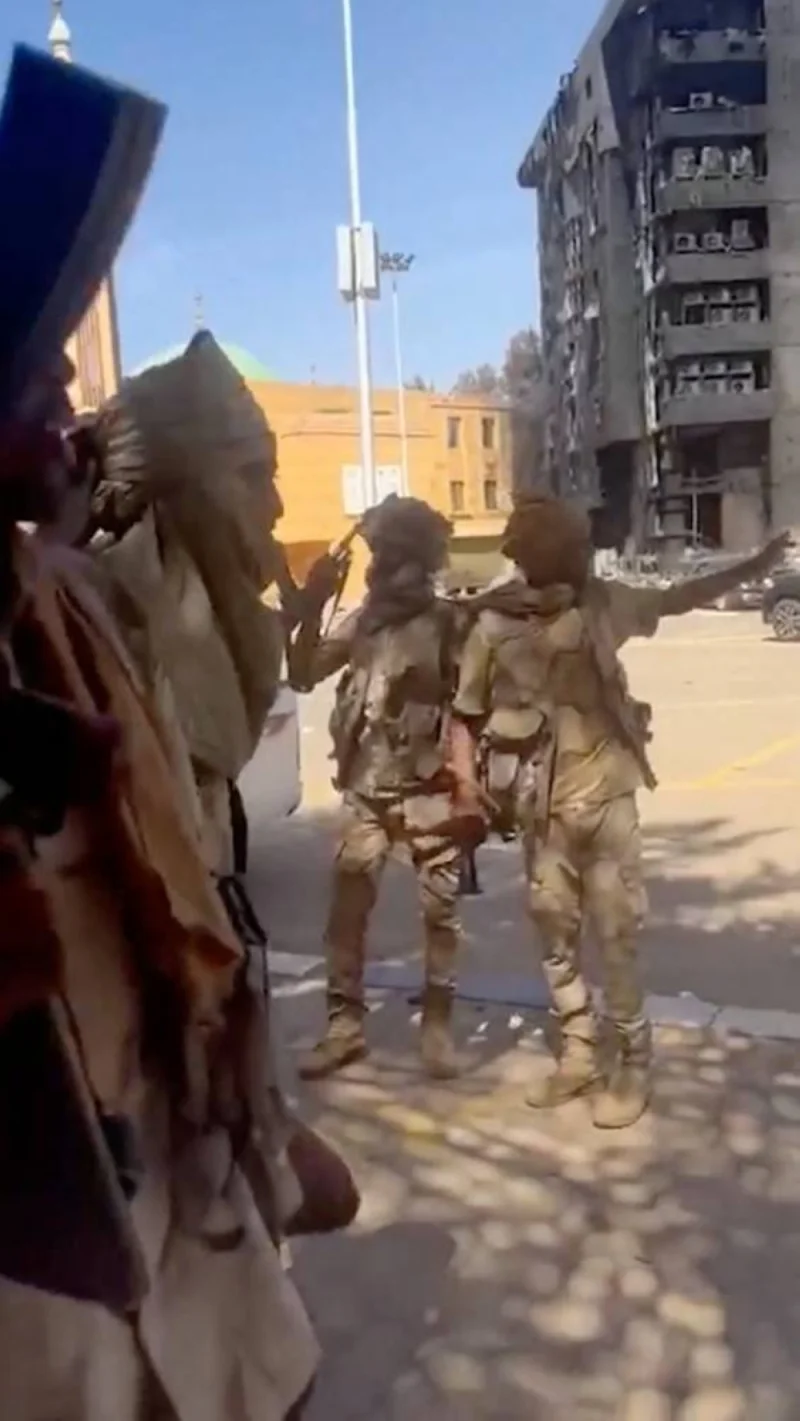Armed Rapid Support Forces (RSF) soldiers are seen inside the central command headquarters in Khartoum, Sudan in this screengrab obtained from a social media video released on April 18. RSF/via REUTERS  