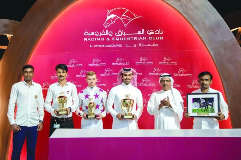 QREC Racing Manager Abdulla Rashid al-Kubaisi presented the trophies to connections of AJS Lattam, which won Al Karana Cup.