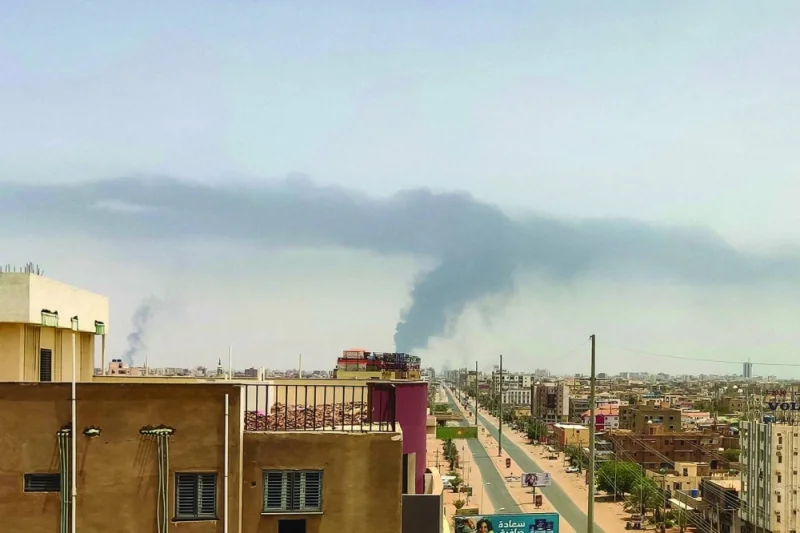 Plumes of smoke rise on the horizon in an area east of Khartoum as fighting continues between Sudan’s army and the paramilitary forces on Friday.