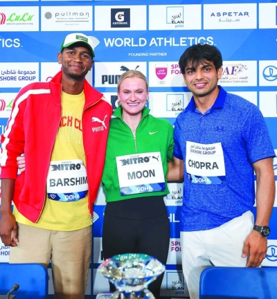 From Left: Qatar’s Mutaz Essa Barshim, American Katie Moon and India’s Neeraj Chopra pose after the press conference on Thursday, on the eve of the Diamond League opener in Doha. PICTURE: Noushad Thekkayil