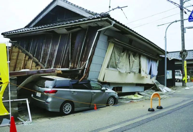 
A collapsed house is seen in the aftermath of an earthquake in Suzu, Ishikawa prefecture, Japan. 