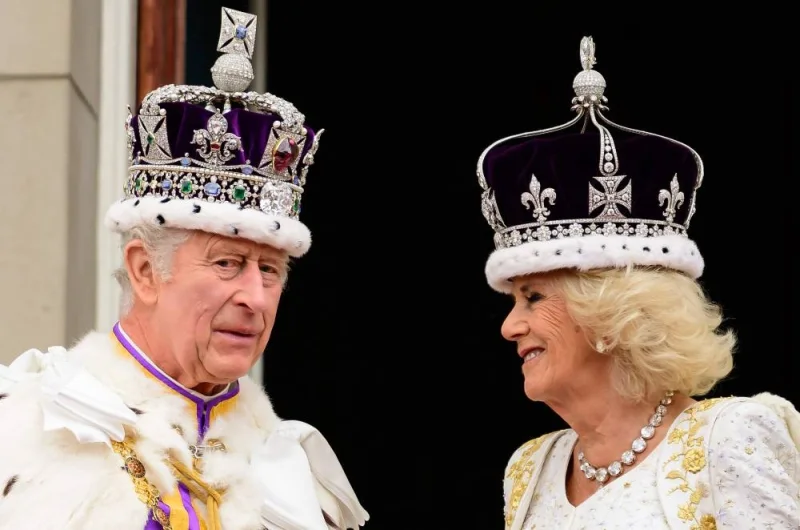 Britain&#039;s King Charles III and Queen Camilla stand on the Buckingham Palace balcony, in London, following their coronations. AFP