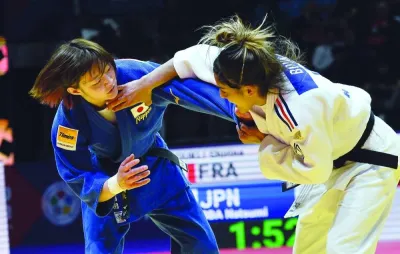 Natsumi Tsunoda in action against France&#039;s Shirine Boukli in the women&#039;s under 48kg category. Tsunoda won the gold.