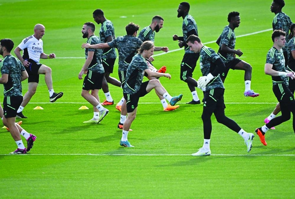 Real Madrid players train on the eve of their Champions League semi-final first leg match against Manchester City. (AFP)