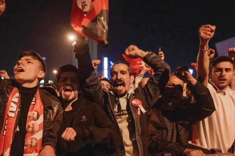 Supporters of Turkiey&#039;s Republican People&#039;s Party (CHP) Chairman and presidential candidate Kemal Kilicdaroglu chant slogans outside CHP headquarters in Ankara. BULENT KILIC / AFP