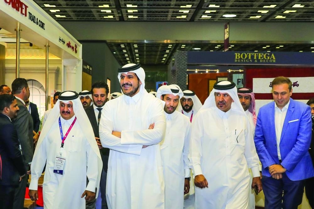 Qatar Chamber chairman Sheikh Khalifa bin Jassim al-Thani and first vice-chairman Mohamed bin Towar al-Kuwari join HE the Minister of Commerce and Industry Sheikh Mohamed bin Hamad bin Qassim al-Thani, who led the opening ceremony of the latest edition of the Build Your House (BYH 2023) exhibition, which opened Monday and will run until May 18 at the Qatar National Convention Centre (QNCC).