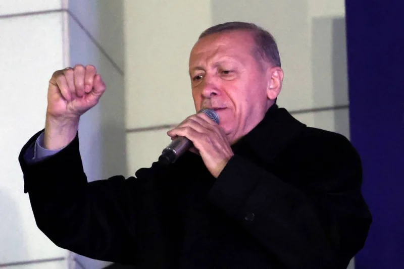 Turkish President Tayyip Erdogan addresses supporters at the AK Party headquarters after polls closed in Turkey&#039;s presidental and parliamentary elections in Ankara. Adem ALTAN / AFP